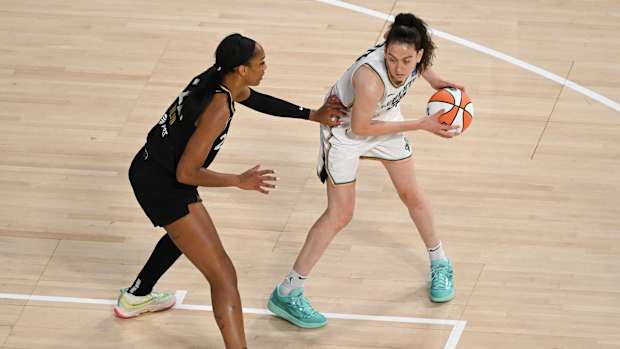 Las Vegas Aces forward A'Ja Wilson defends New York Liberty forward Breanna Stewart.